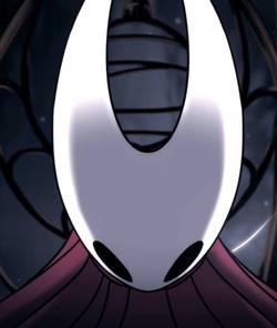 Hornet stands dramatically in a cage in Hollow Knight Silksong