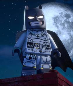 Batman stands on a building in Lego Batman Legacy of the Dark Knight