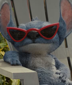 Stitch wearing red sunglasses in the 2025 live-action Lilo and Stitch movie